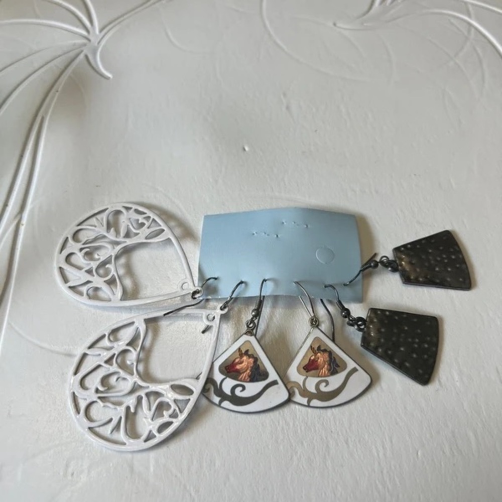 Elegant Trio of Earrings in White, Black, and Brown